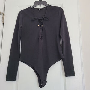 Women's Dynamite Black Long Sleeve Lace-Up Bodysuit L with Gold Accents